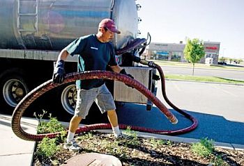 Jose is in the middle of a grease trap cleanout in Aventura, FL